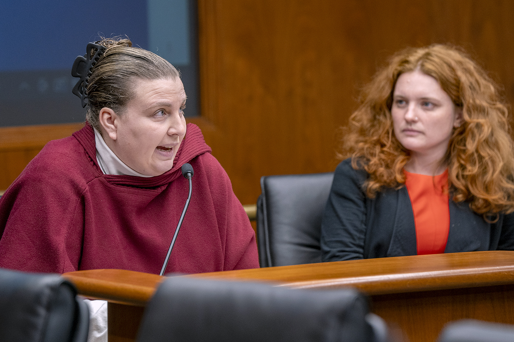Kelly Kausel, a nutrition assistant at Roseville Area Schools, testifies Wednesday in support of HF3556, a bill requiring a minimum time for students to eat lunch. Rep. Sydney Jordan, right, is the bill sponsor. (Photo by Michele Jokinen)
